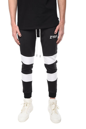 TROUSER WITH CONTRASTING DOUBLE WHITE STRIPES - ZYARI